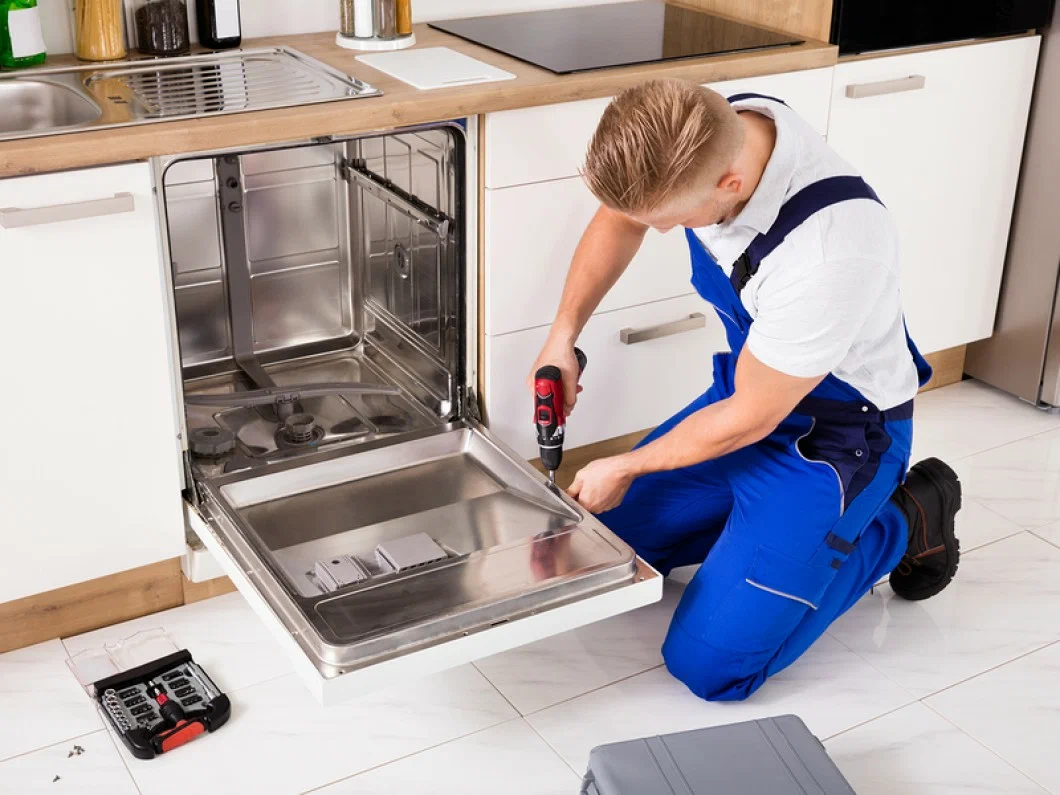 Fitting and testing a household appliance in a laundry room