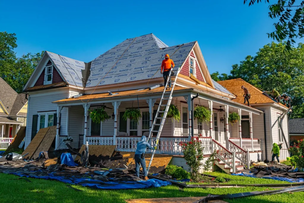 Crew replacing the roof on a historic Texas home