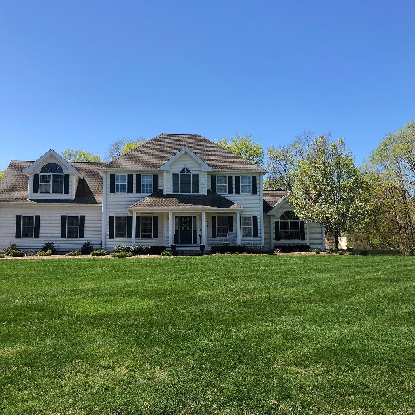 Colonial home exterior repainted in Swansea, Massachusetts