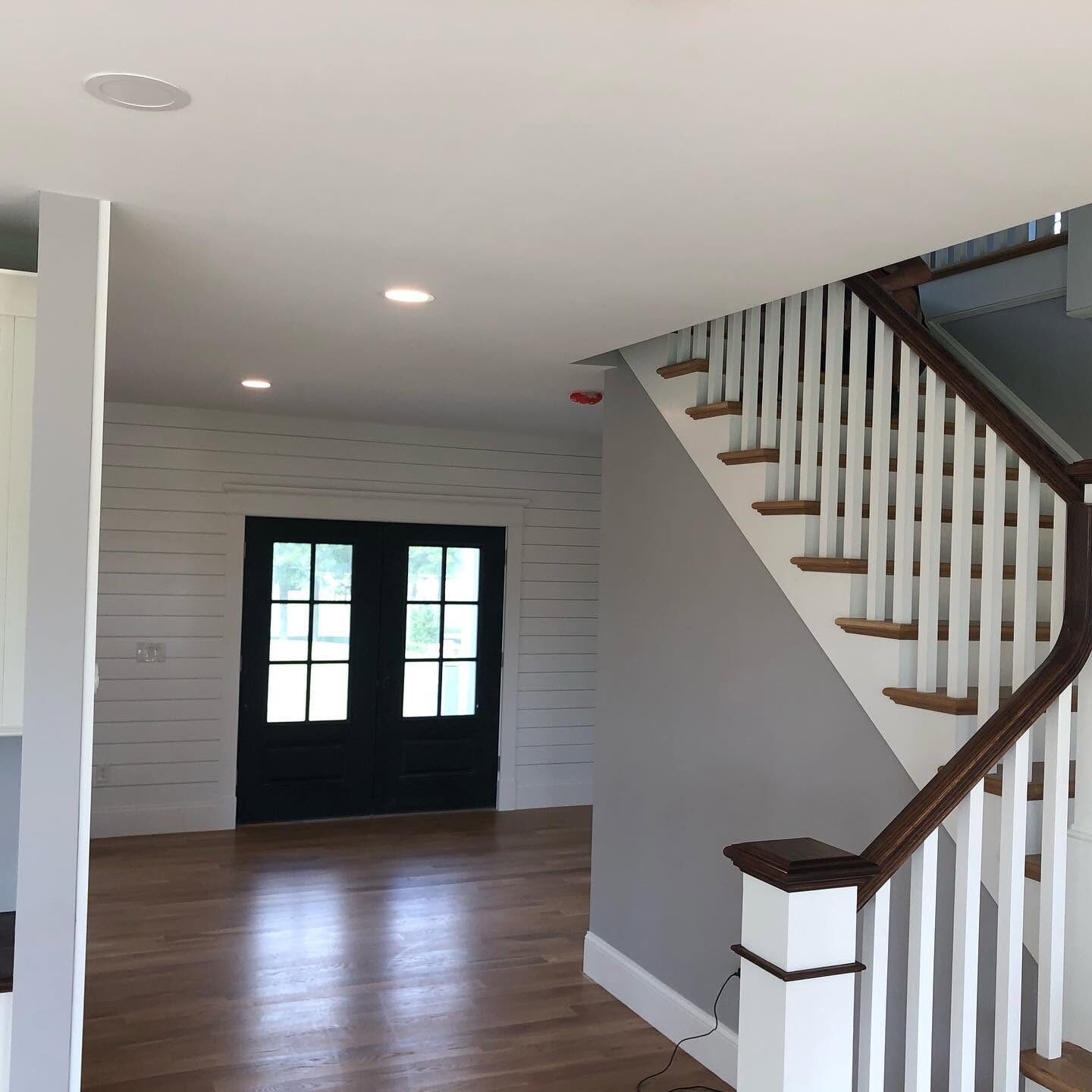 Entry hall and staircase with fresh white paint