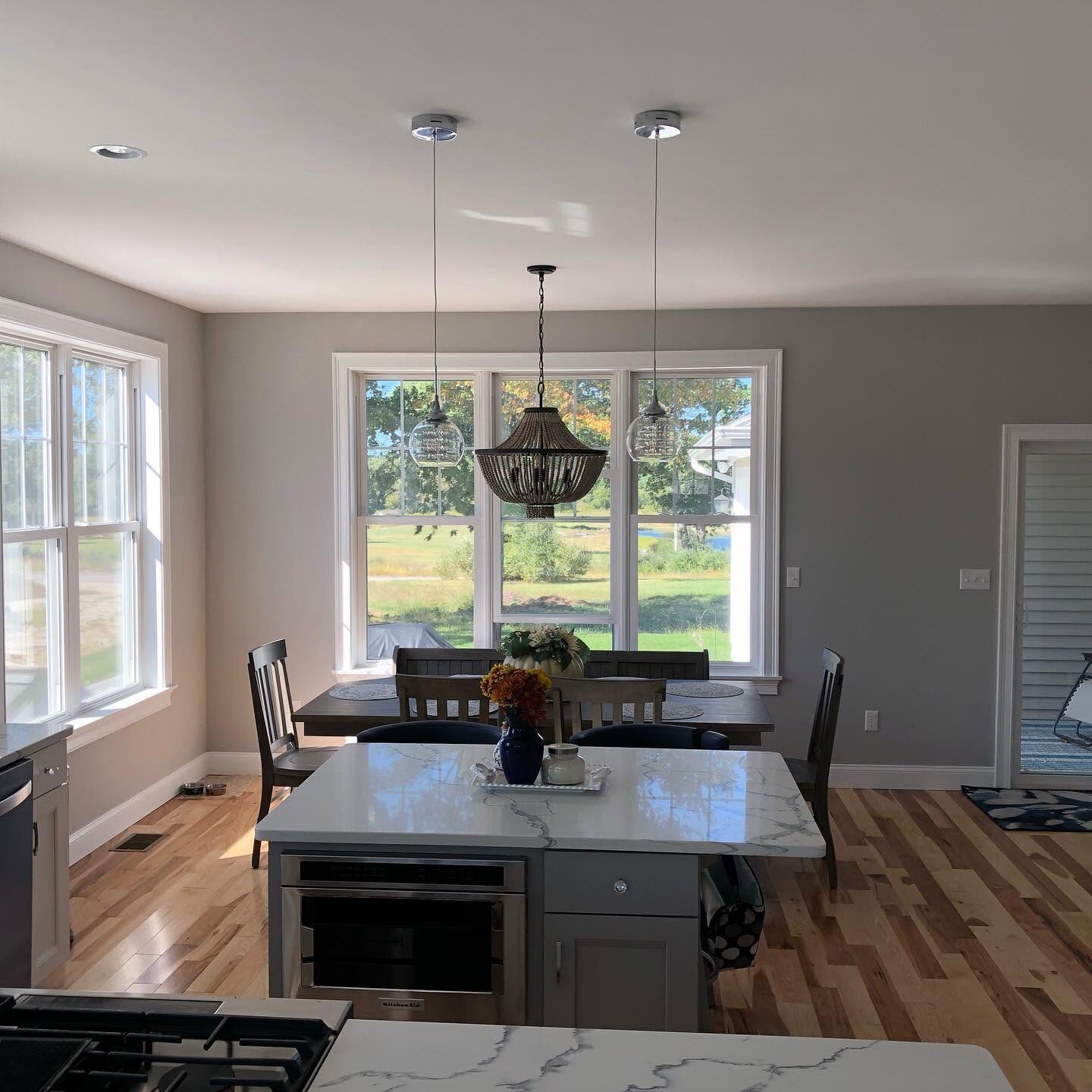 Painted kitchen and dining area with island