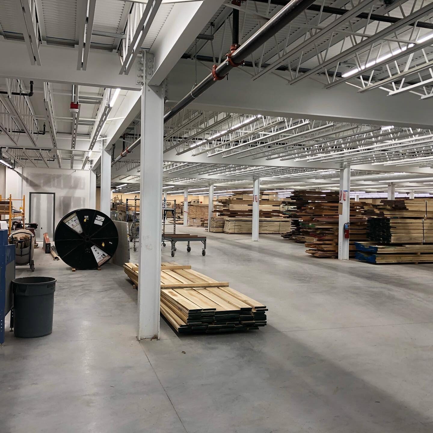 Painted warehouse interior with exposed structure