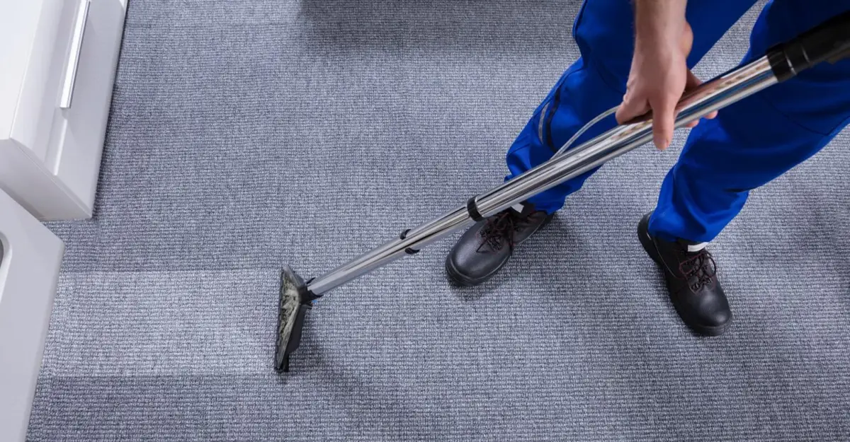 Carpet power washing wand lifting dirt from office carpet