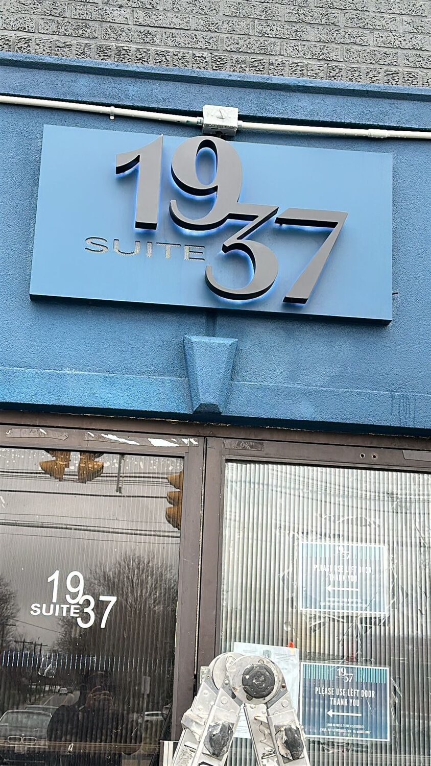 Backlit suite number panel for Suite 37