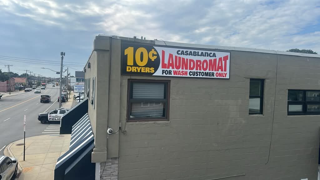 The same sign on the building for Casablanca Laundromat