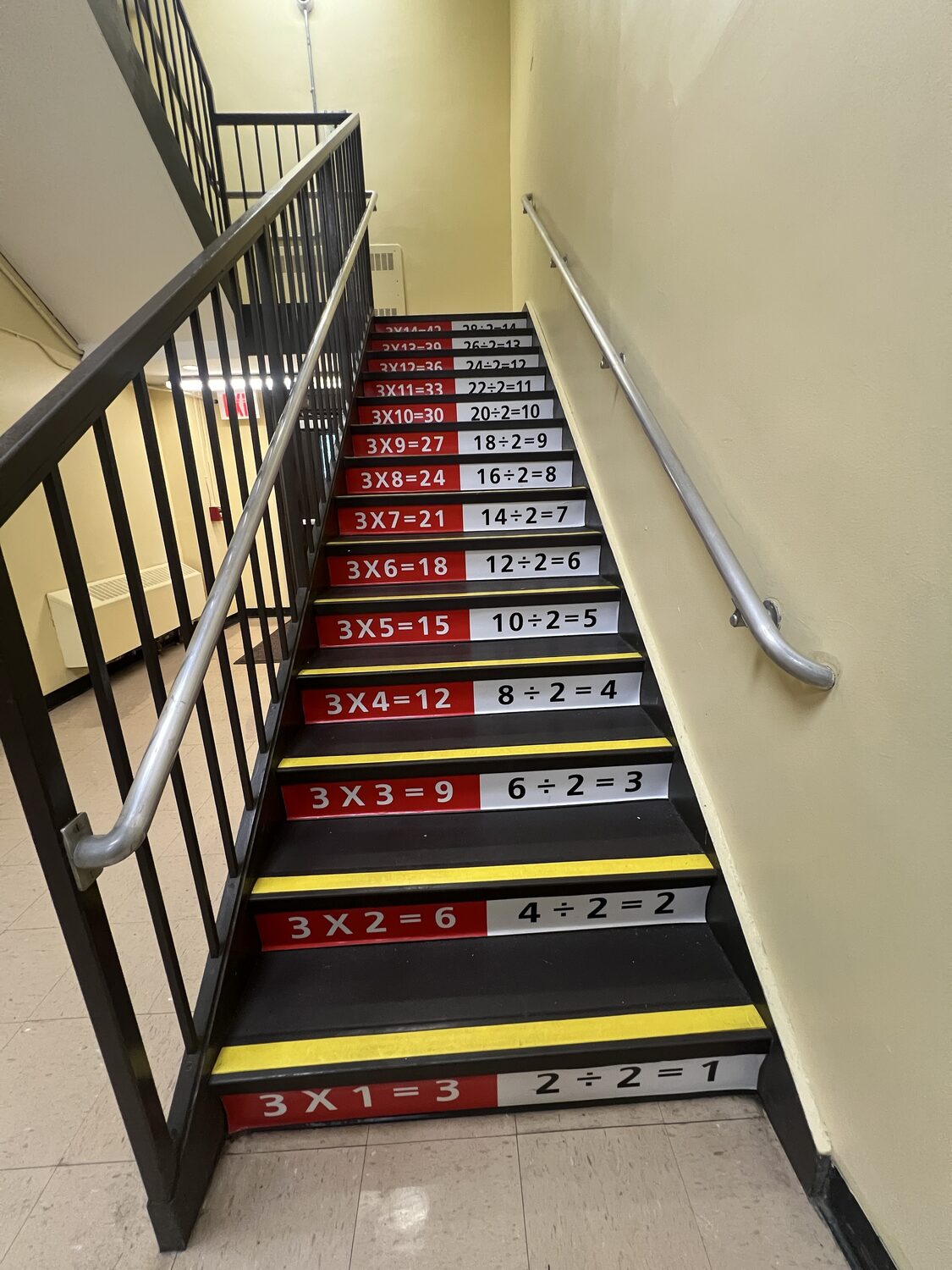 Times tables printed on the stairs for School
